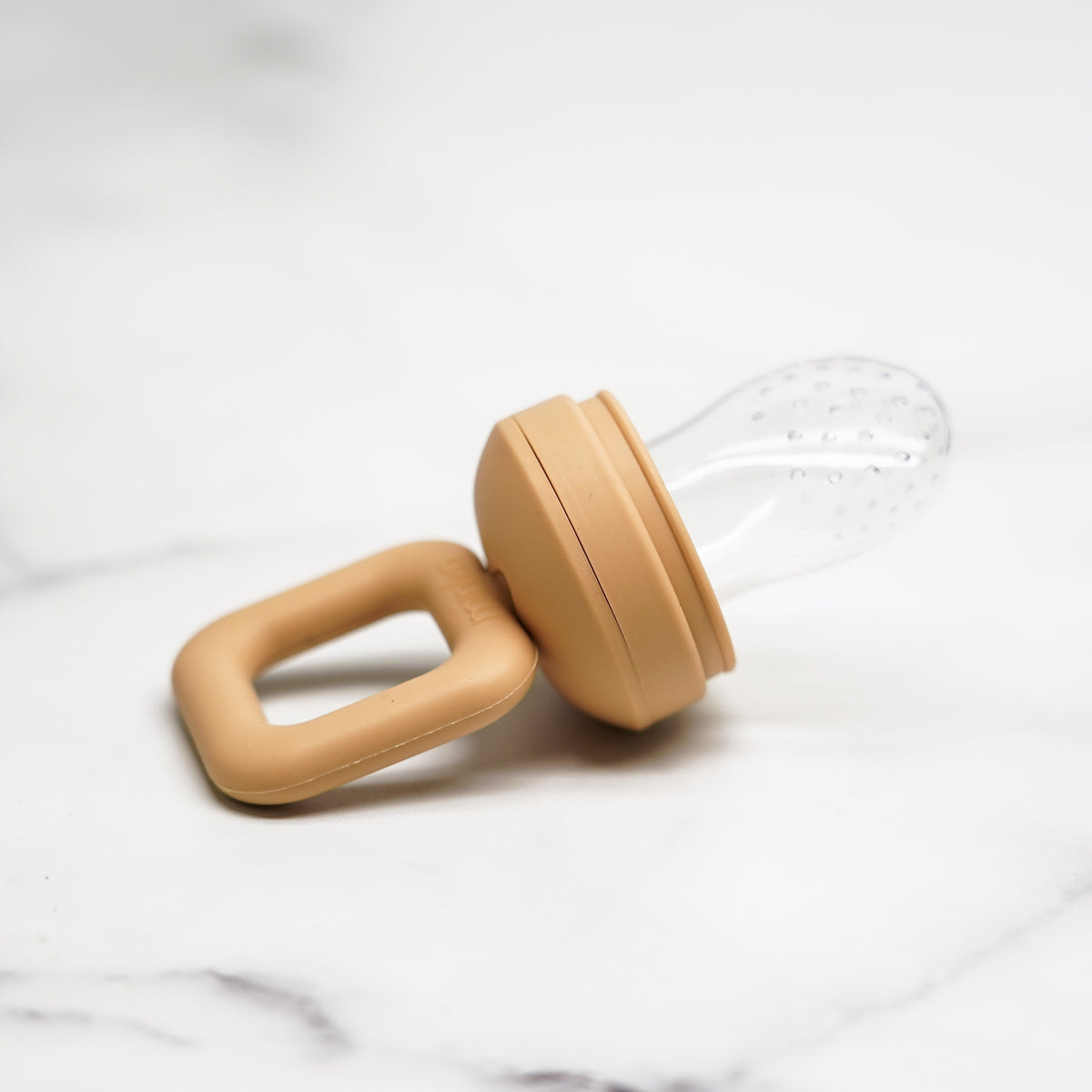 Tétine alimentaire de dentition