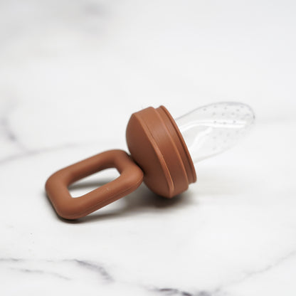 Tétine alimentaire de dentition